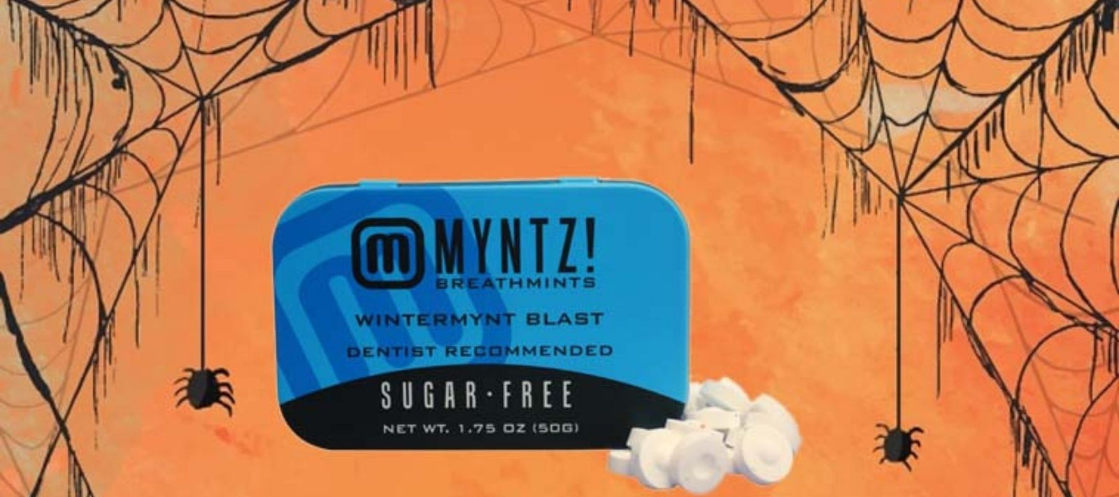 WinterMyntz posed against a spooky Halloween background