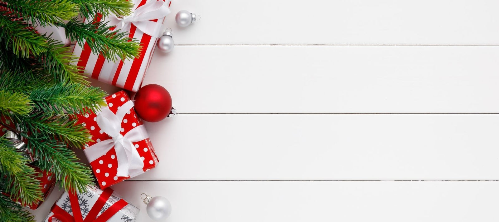 Wrapped Presents Laying Underneath a Christmas Tree